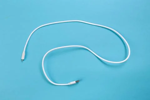 USB cables ob blue background. Connectors and sockets for PC and mobile devic Stock Photos