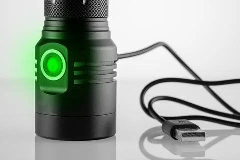 USB Charging for LED Handheld Flashlight Stock Photos