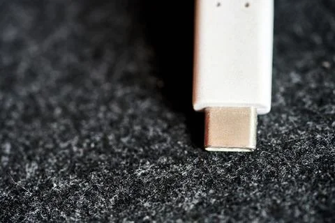 USB connector on dark surface Stockfoto's