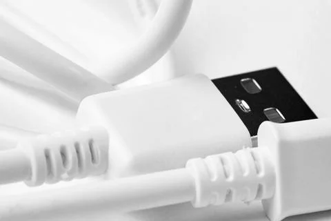 Usb data cable connectors for smartphone isolated on white, close-up. Stock Photos