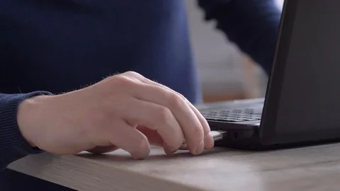 Usb data stick, Inserting sd memory card reader into port of computer laptop Stock Footage 106234898