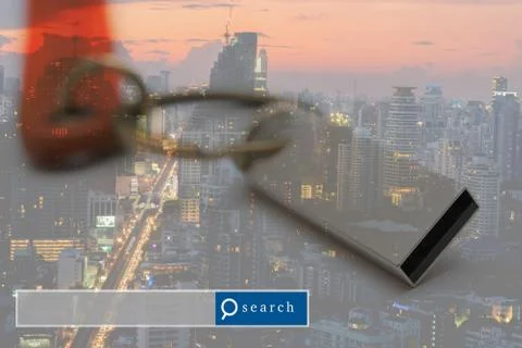 USB Flash Drive double exposure with city light with search engine graphic Stock Photos