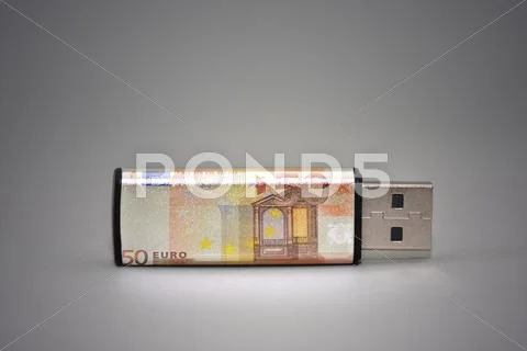 Usb Flash Drive With The Euro Banknote On Gray Background.