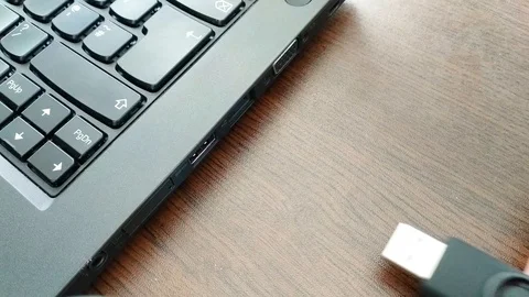 USB flash drive insert in computer Stock Footage 105232281