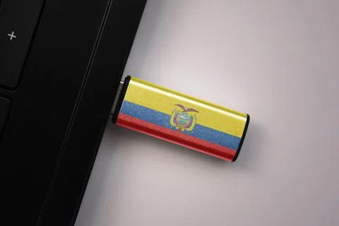 Usb flash drive in notebook computer with the national flag of ecuador on g.. Stock Photos