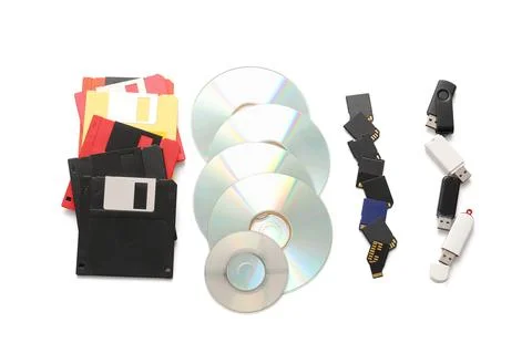 USB flash drives, CD and floppy disks on white background Stock Photos