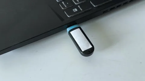 USB flash in laptop connector close-up Stock Footage 320523826