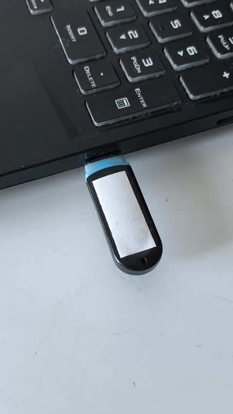 USB flash in laptop connector close-up Stock Footage 320523848