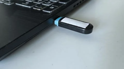 USB flash in laptop connector close-up Video stock 320523855