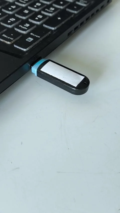 USB flash in laptop connector close-up Stock Footage 320523872