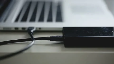 Usb hdd connected to a laptop. Dolly slider shot Stock Footage 44388609
