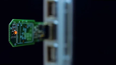 To USB hub is connected disassembled flash drive Stock Footage 82692516