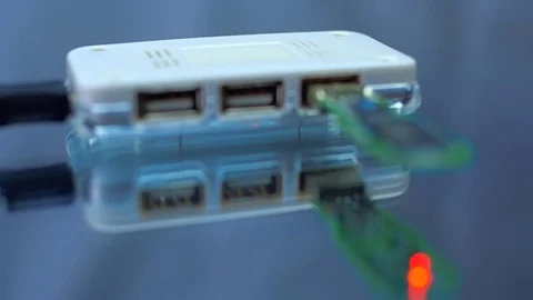 To USB hub is connected disassembled flash drive Stock Footage 82692597
