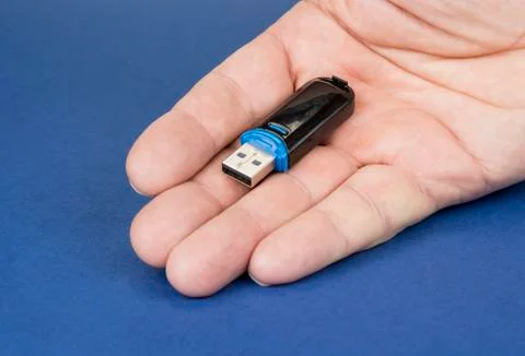 USB keys to save data on the bue background Stock Photos