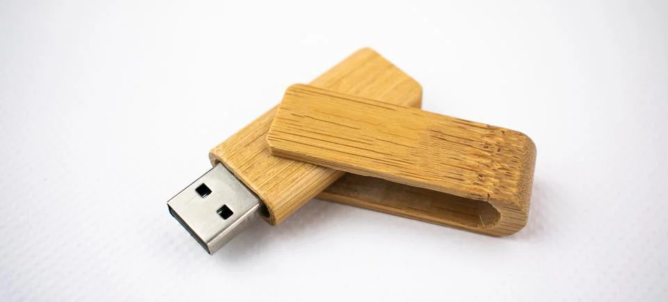 USB memory for data storage, on white background, made in wood Stock Photos