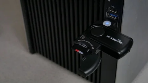 USB Multi-Card Reader Plugged-in to Computer Video stock 89636865