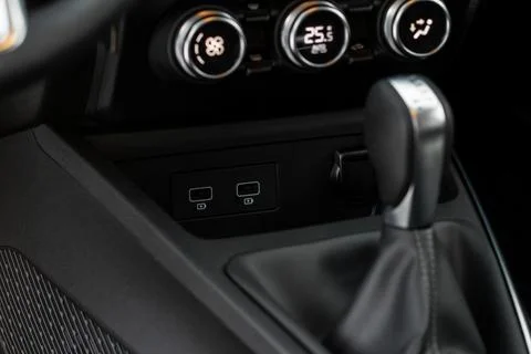 USB port in the car panel close up. Car interior detail. Car usb charger deta Foto stock