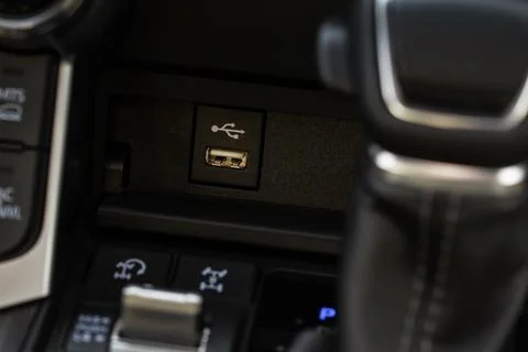 USB port in the car panel close up. Car interior detail. Car usb charger deta Stock Photos