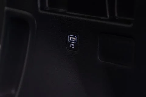 USB port in the car panel close up. Car interior detail. Car usb charger deta Stock Photos