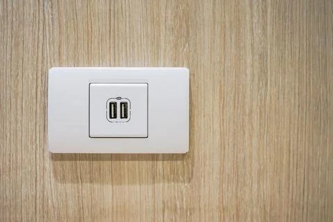USB socket port with USB signage icon on wooden wall background, Prepared t.. Stock Photos