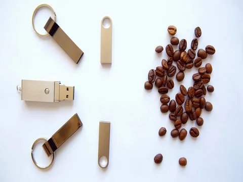 USB stick and coffee beans on white background. green screen. dolly shot Stock Footage 73854407