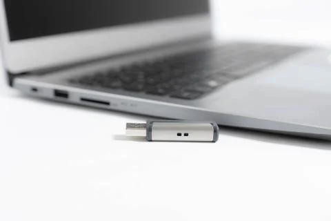 USB stick and interface of a notebook Stock Photos