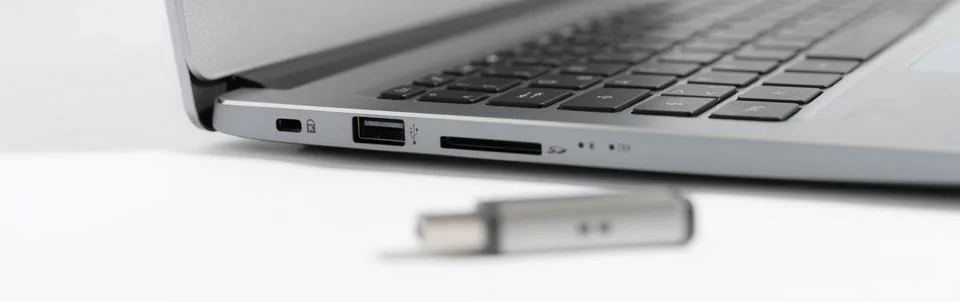 USB stick and interface of a notebook Stock Photos
