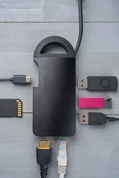 USB Type C adapter or hub with various accessories. Stock Photos