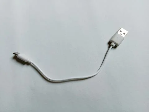 USB type C cable on white background. Gadget electronic theme. Фото