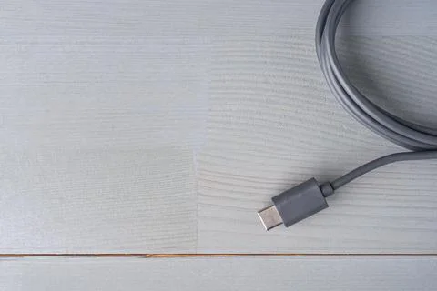 USB Type C connector with a grey cable. Stock Photos