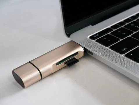 USB Type-C Memory Card Reader Attached to a Laptop Stock Photos