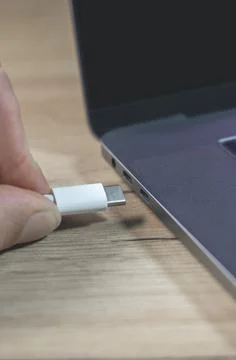 USB Type C Port Cable for fast charging laptop. Close up photo. Stock Photos