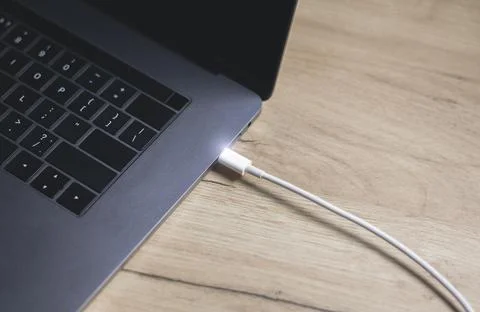 USB Type C Port Cable for fast charging laptop. Close up photo. Stockfoto's