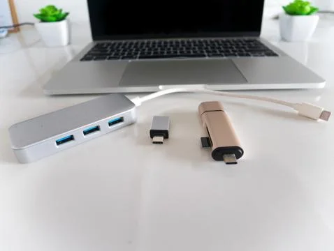 USB to USB Type-C Adapter Converter with a Laptop Stock Photos