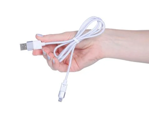 USB wire charger cable in hand Stock Photos