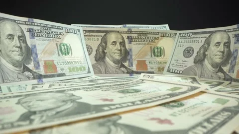 USD american bills on the table with black background. Low angle. Macro shot Stock Footage 141181072