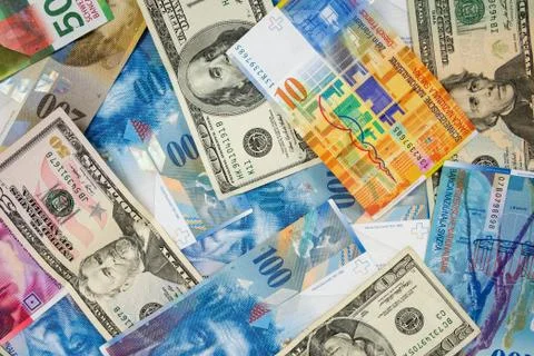 USD and CHF banknotes as background Stock Photos