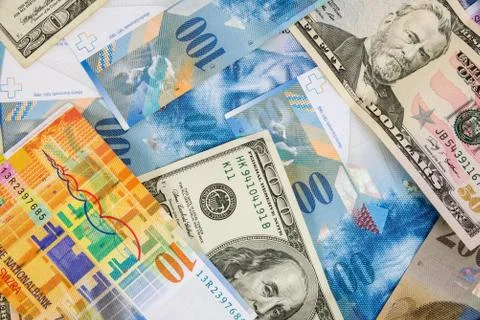 USD and CHF banknotes as background Stock Photos