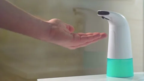Use automatic foam dispenser. hand disinfection Stock Footage 131001219