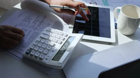Use calculator for financial planning Stock Footage 202120260