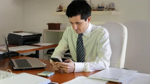 Use a cell phone at work and distracted Stock Footage 60687751