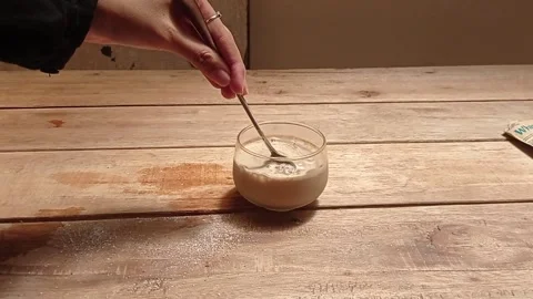 Use a coffee stirring spoon Stock Footage 139430375