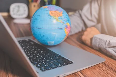 Use a computer to work to make money to communicate around the world Stock Photos