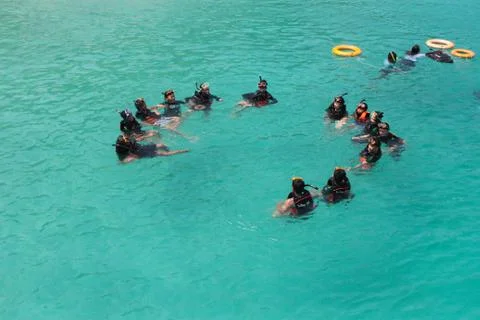 Use a floating kit to float on the sea front Stock Photos