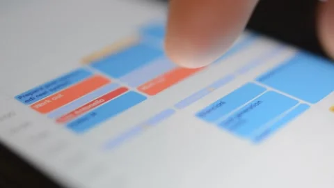 Use google phone calendar app for planning year. iphone calendar. Stock Footage 297844043