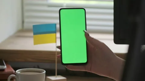 Use green screen for copy space closeup. Chroma key mock-up on smartphone in Stock Footage 202571110