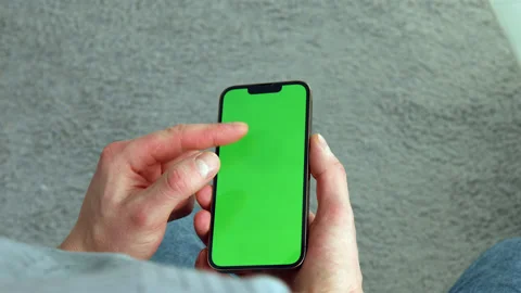 Use green screen for copy space close up. Chroma key mock-up on smartphone Stock Footage 232857655