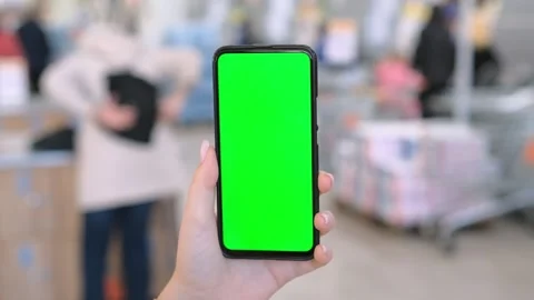 Use green screen for copy space closeup. Chroma key mock-up on smartphone in Stock Footage 270540985