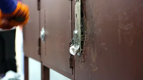 The use of a hammer to break the lock in the door Stock Footage 115048207