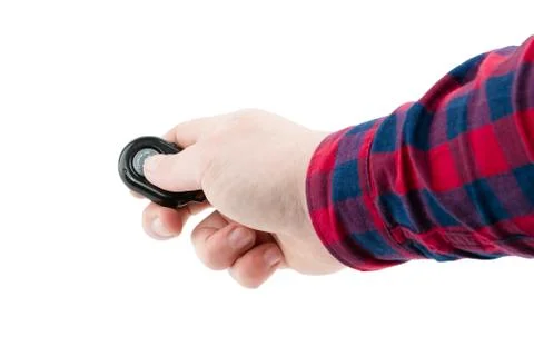 Use hand to press camera remote. isolated on white background 库存照片